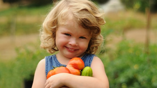 Girl Holding Fresh Produce