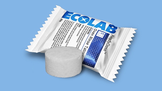 Ecolab ReadyDose Oven Cleaner Tablet with packaging and a white cleaning tablet